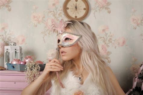 Beautiful Blonde Holds Carnival Mask In Her Face Stock Photo Image Of Dressed Lips
