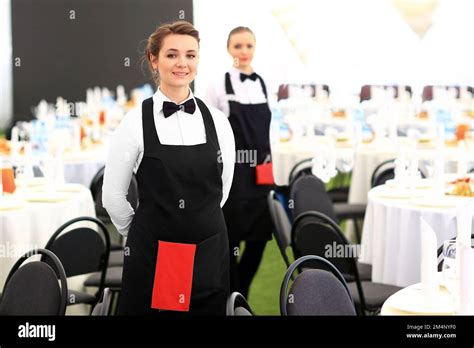 Large Group Of Waiters And Waitresses Standing In Row Stock Photo Alamy