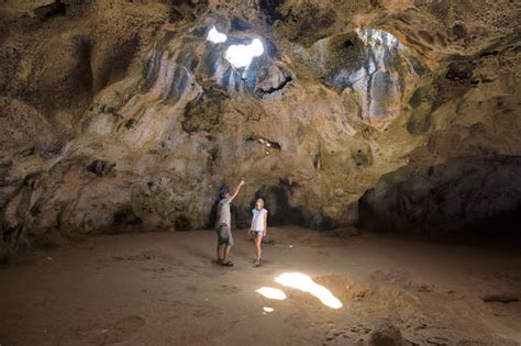 Visitors to Quadirikiri Cave on Aruba.