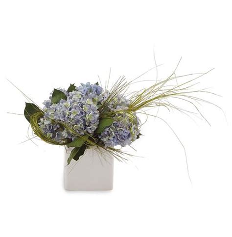 Faux Blue Hydrangea Flowers Citrus Grass Leaves In White Cube Vase