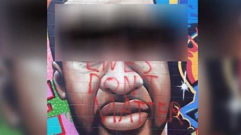 George Floyd mural in Houston defaced with racial slur