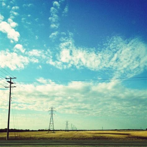 Premium Photo Electricity Pylons On Countryside Landscape