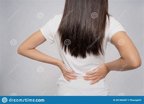 Asian Woman Has Back Pain She Used Her Hands To Massage Her Back Stock