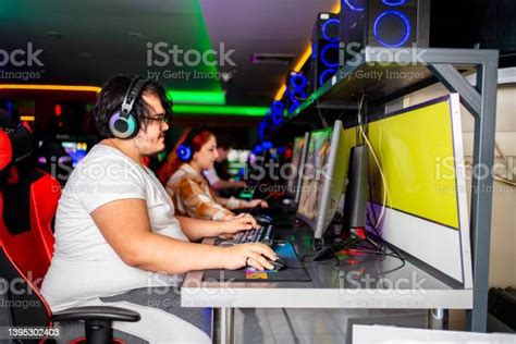 Overweight Gamer Playing Esports Stock Photo Download Image Now