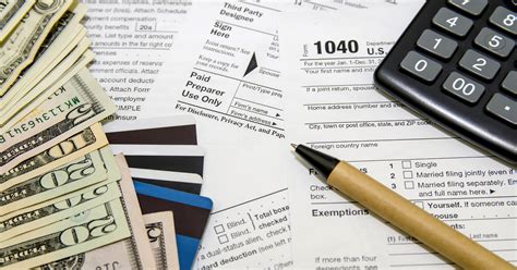 Paying Taxes The Pros And Cons Of Doing It With A Credit Card