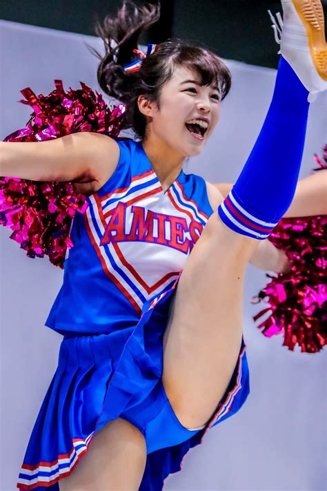 Asian Cheerleader Dance In Blue And Red