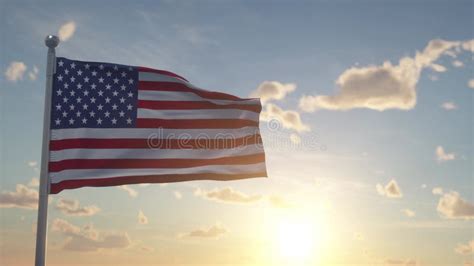 United States Of America Flag Waving Proudly In The Wind With Sun