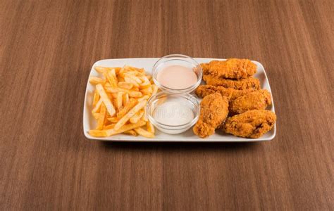 Chicken Wings With Fried Potatoes Stock Image Image Of Potato