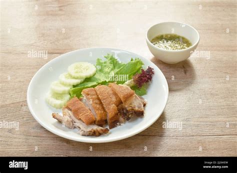 Fried Crispy Slice Pork Leg With Vegetable Dipping Spicy Sauce Stock