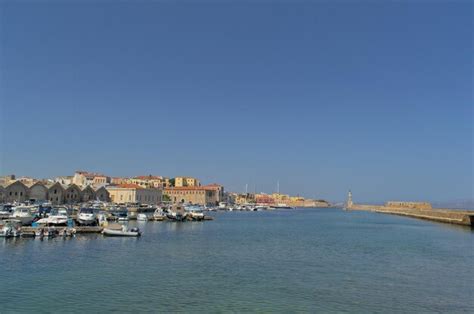 Premium Photo Sailboats Moored On Sea By Buildings Against Clear Sky