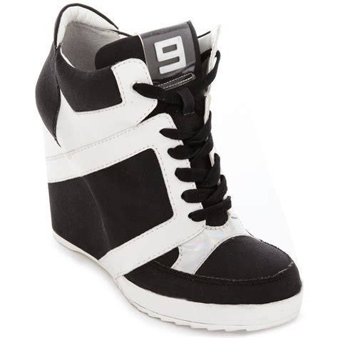 Nine West Elzorro High Top Wedge Sneakers In Black White Lyst