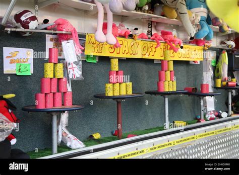 leatherhead fun fair games knock cans   balls tin  alley