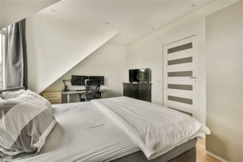 Mansard Bedroom With Minimalist Interior Design Stock Photo Image Of