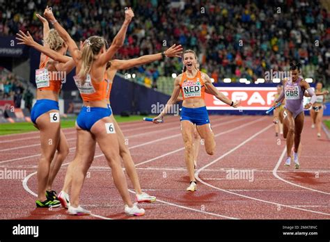 Femke Bol Of The Netherlands Center Celebrates With Her Team After