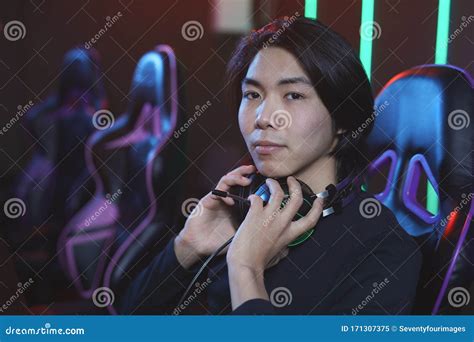 Asian Gamer Looking At Camera Stock Image Image Of Holding Keyboard