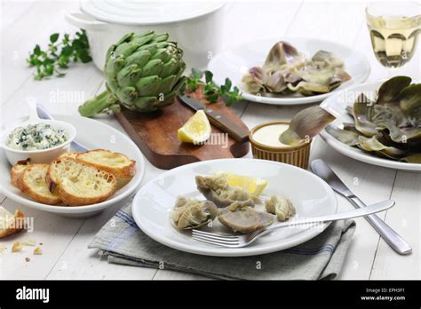 Eating Boiled Artichoke Italian Cuisine Stock Photo Alamy