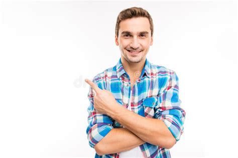 Portrait Of A Cute Handsome Young Man Pointing Away Stock Photo Image