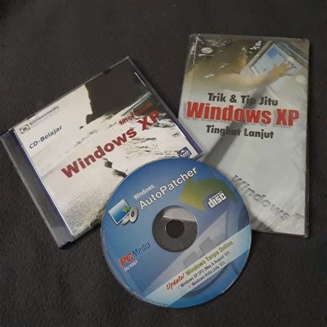 Buku Trik Tip Windows XP CD Tutorial CD Auto Patch Win XP SP2 On