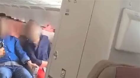 Watch Terrified Passengers After Man Opens Planes Emergency Door Mid