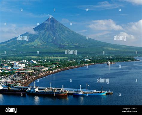 The city of Legazpi with Mt Mayon, the Philippines' most active volcano ...