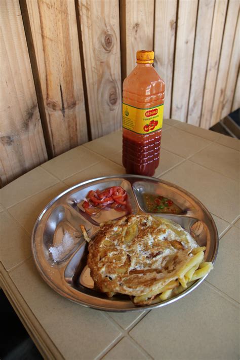 Chips Mayai (French Fries Omelet) - A Staple of Tanzanian Junk Food