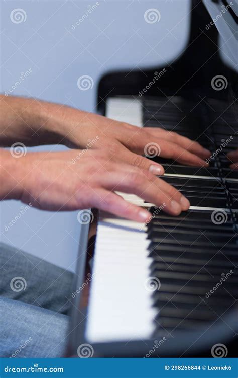 Human Hands Playing the Keys Notes and Chords on a Classic Black Piano ...