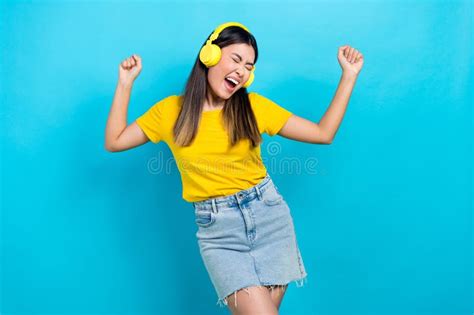 Photo Of Crazy Girl With Straight Hairdo Dressed Yellow T Shirt Singing