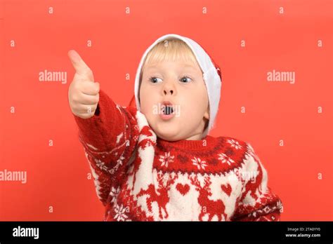 cute boy child pointing direction christmas stock photo alamy