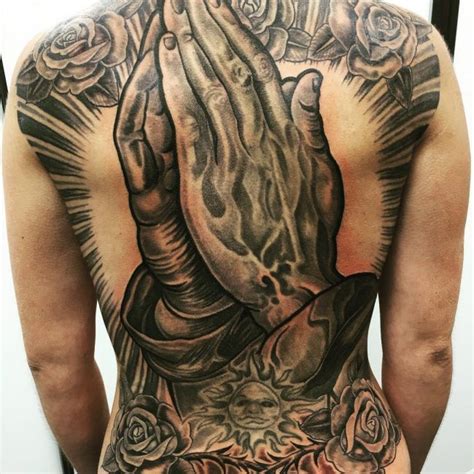 Top 91 Pictures Praying Hands With Sun Rays Tattoo Updated