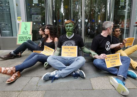 Extinction Rebellion Climate Protesters Glue Themselves To Government