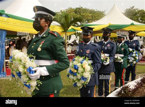 Female Members Of The Nigerian Armed Forces Stand In Line Carrying