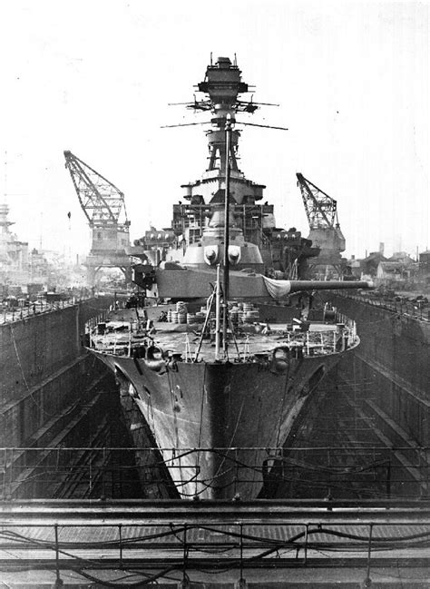 A Frontal View Of Renown Class Battlecruiser HMS Repulse In Drydock