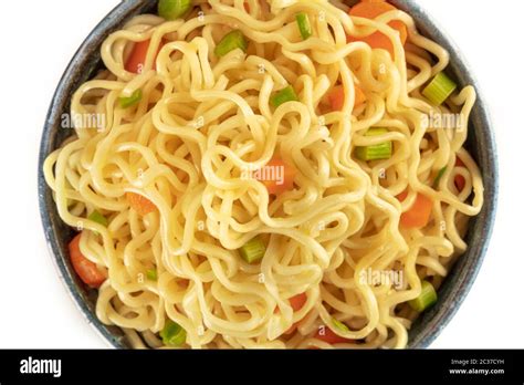 Instant Noodles With Carrot And Scallions Overhead Close Up Shot On A