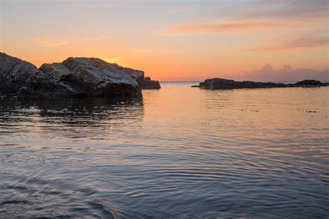 Online Crop Landscape Photography Of Rock Formation Of Body Of Water