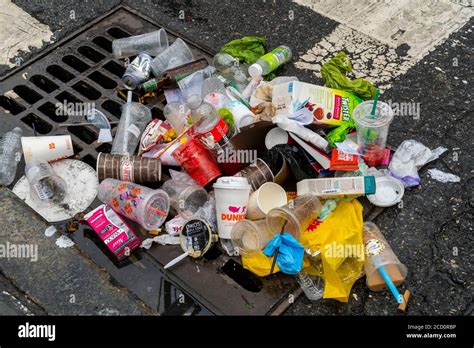 A Clogged Storm Drain Filled With Garbage In The Chelsea Neighborhood