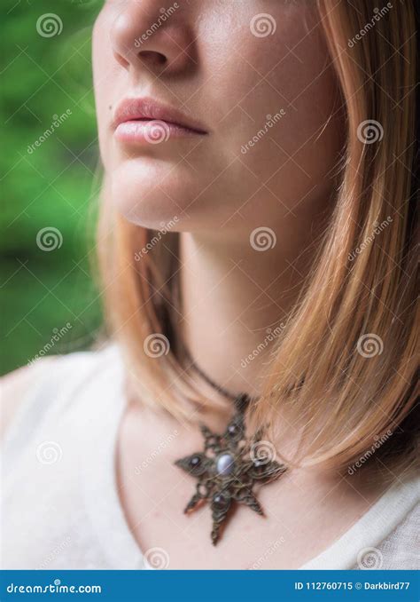 Portrait Of Beautiful Woman With Necklace On Her Neck Stock Image