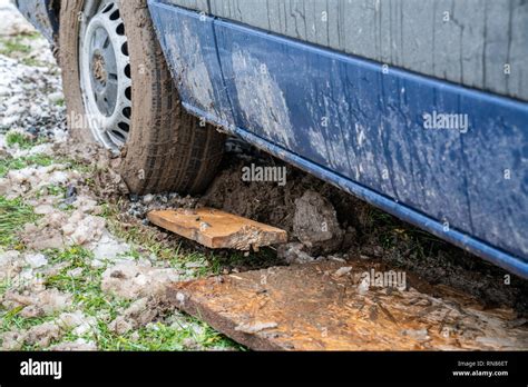 Buried Car In Mud Stock Photo Alamy