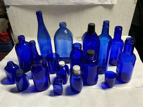 Cobalt blue bottles - Legacy Auction Company