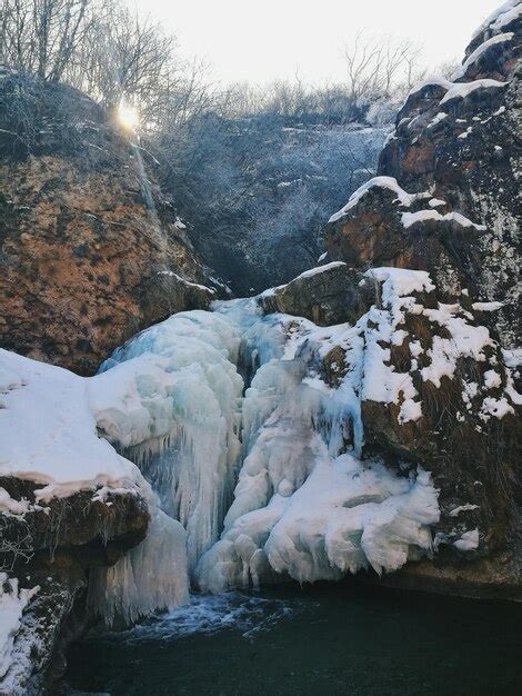 Premium Photo Frozen Water In Winter