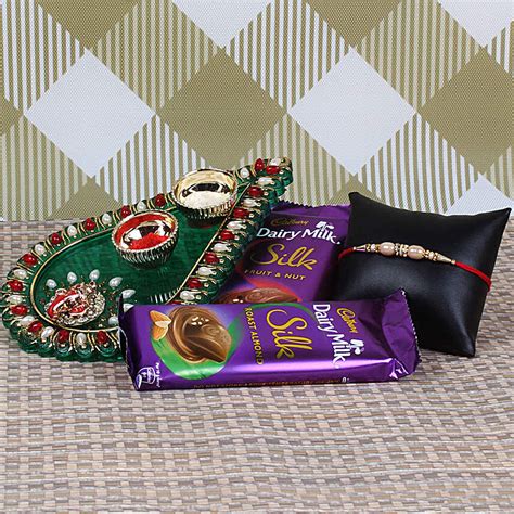 Buysend Puja Thali With Rakhi And Chocolates Online Fnp