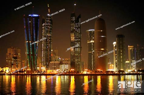 Night shot of the Doha skyline, Tornado Tower, Navigation Tower, Peace ...