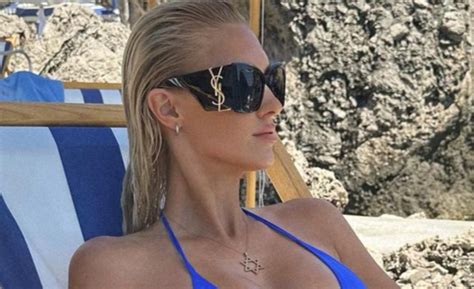 Veronika Rajek Flaunts Underboob In A Blue Bikini While Relaxing In Italy Blacksportsonline