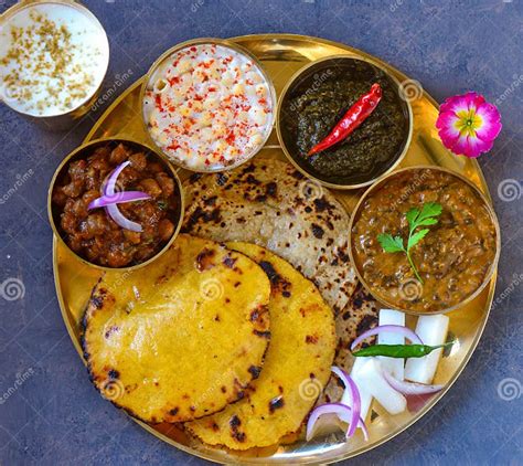 Punjabi Vegetarian Thaali Meals Served Traditionally In Brass Plate