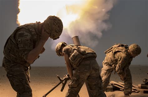 Us Infantry Soldiers Assault Through The Desert Live Fire Exercise