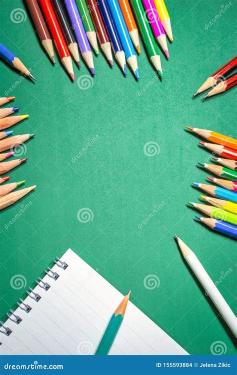 Colorful Pencils Over Green Chalkboard Stock Photo Image Of Green