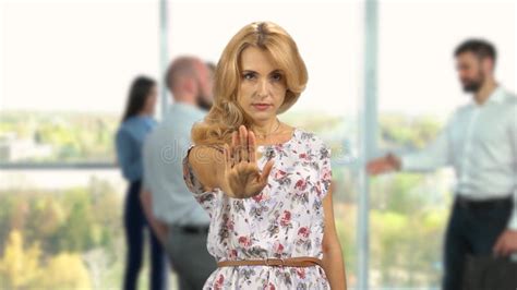 Serious Blonde Mature Woman Shows Her Palm As Sign Of Prohibition Stock Video Video Of