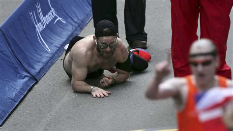 Boston Strong Man Crawls Across Finish Line Of Boston Marathon