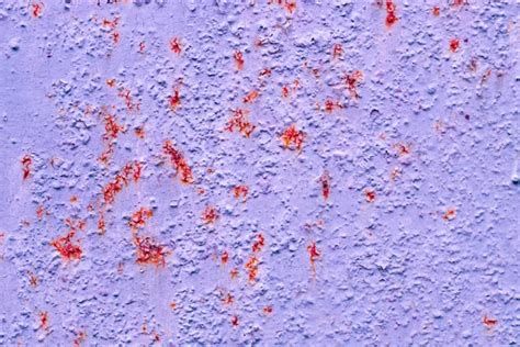 Closeup View Of Old Weathered Lilac Texture With Red Patches Paint And