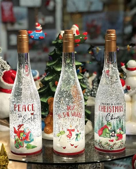 Lighted Wine Bottle With Swirling Glitter Peace On Earth Design Snow G