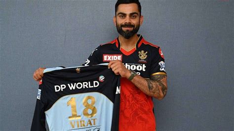 Ipl 2021 Rcb Skipper Virat Kohli Unveils Special Blue Jerseys Ahead Of Kkr Clash India Tv